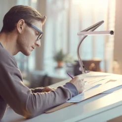 Daylight Company Techne Lamp D35000 -Painting Tool Shop 35000 Techne AG 01 Architect working on a design scaled 1